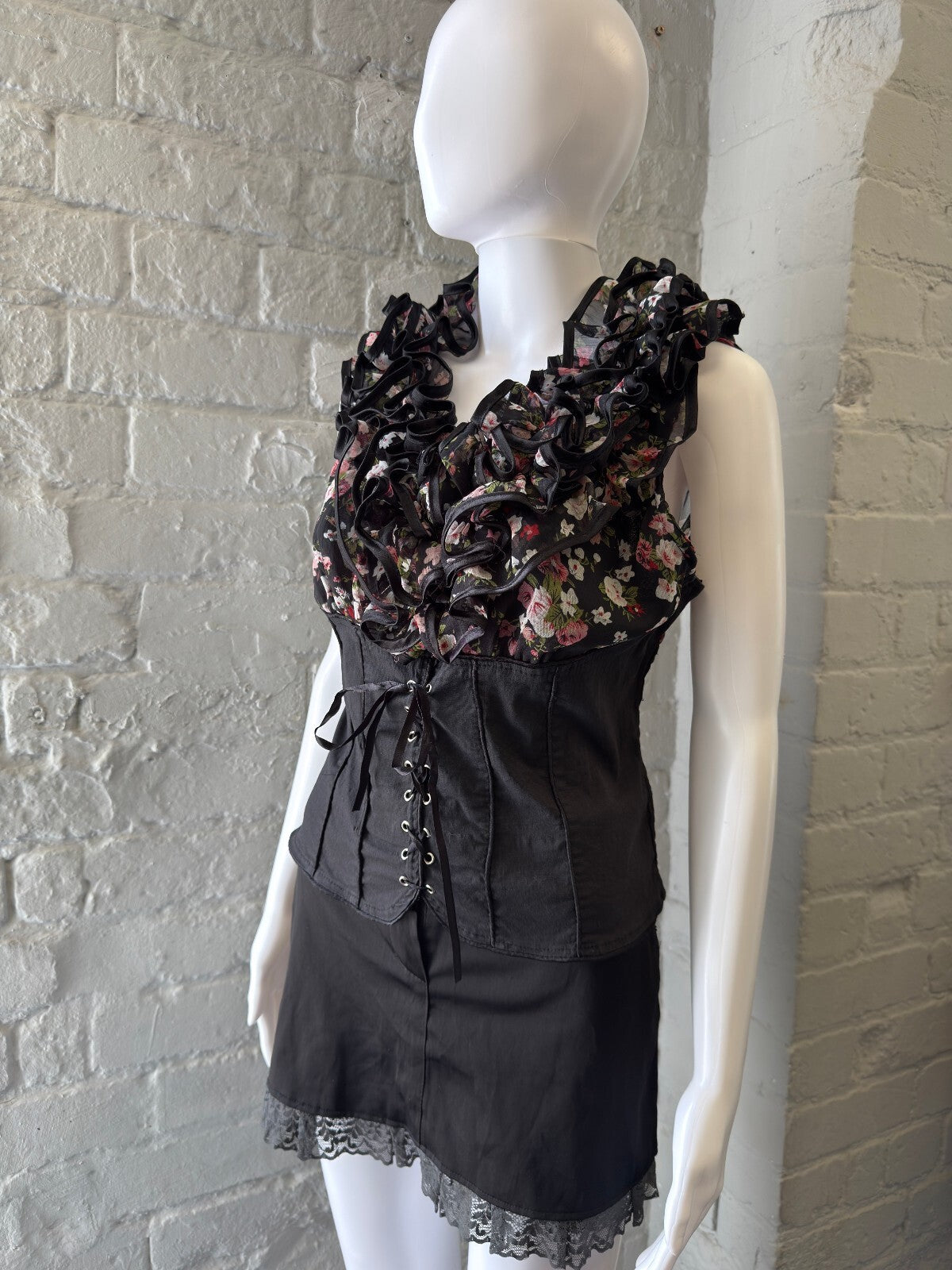 Black Mini Skirt with Lace Trim and Button Detail