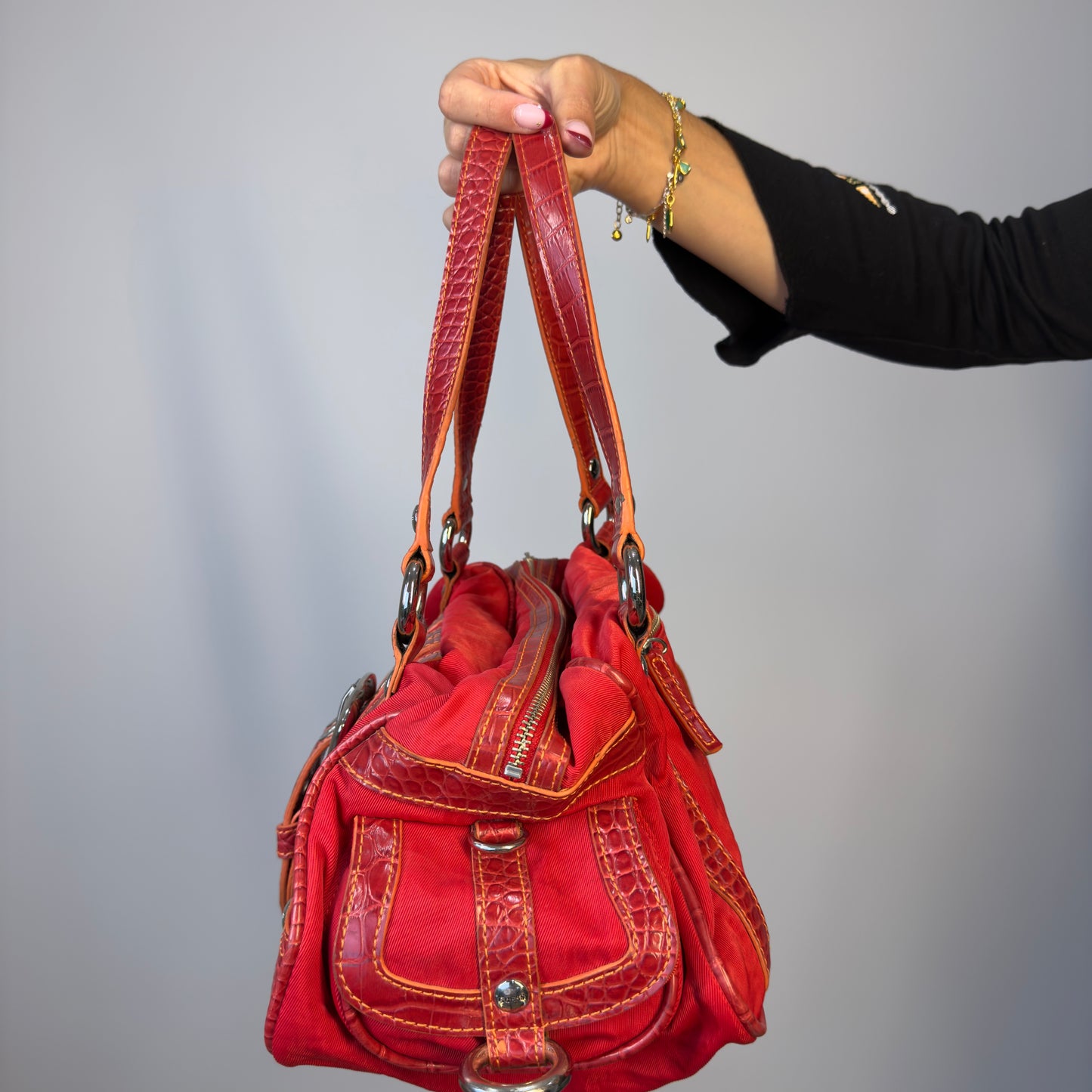 Red croc effect handbag with silver buckle