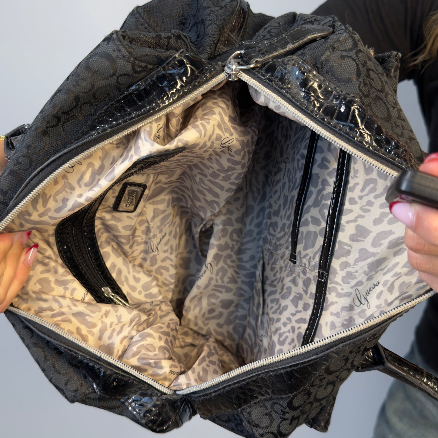 GUESS Los Angeles black monogram handbag