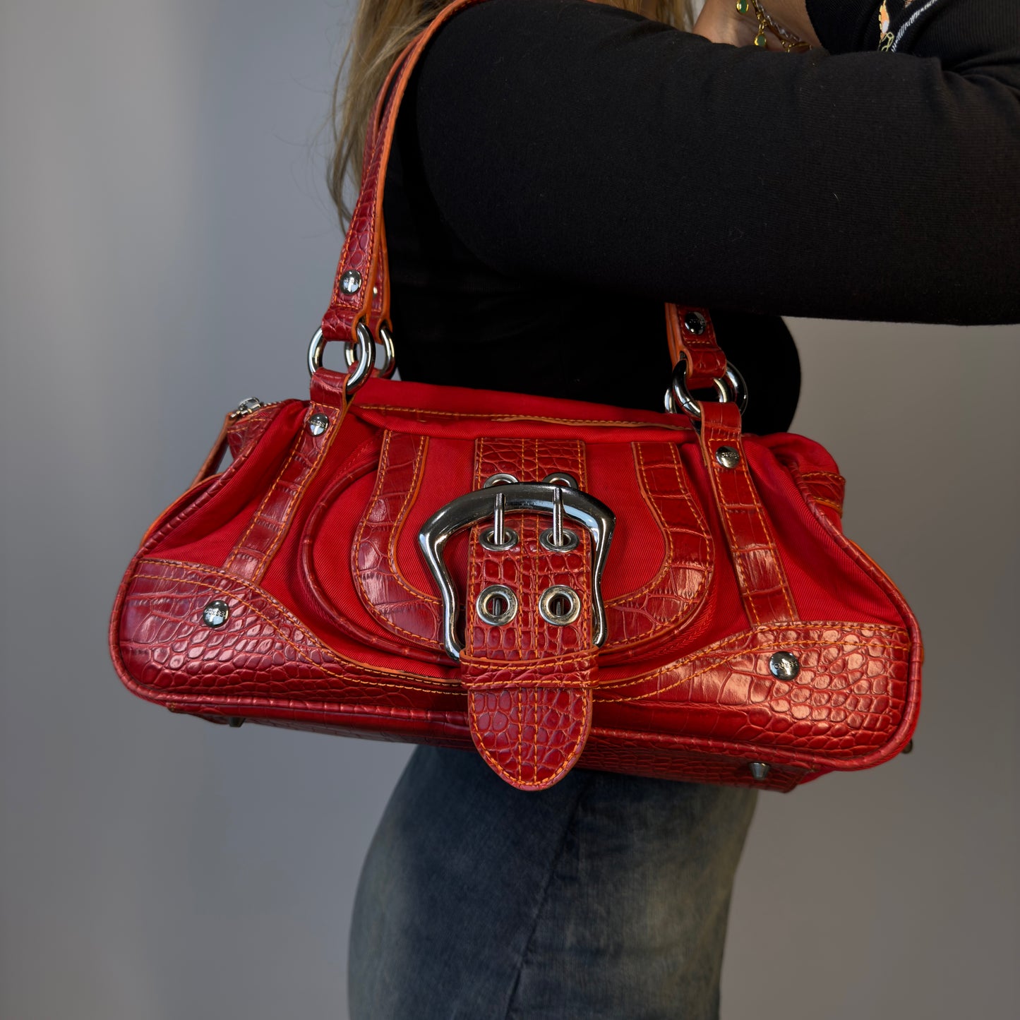 Red croc effect handbag with silver buckle