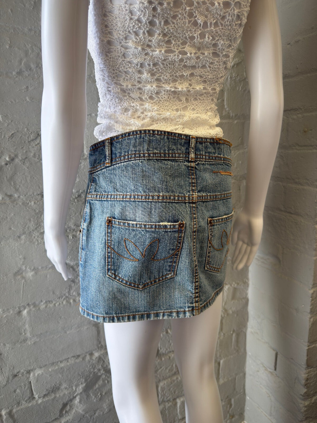 Light Blue Denim Mini Skirt with Back Pocket Detailing
