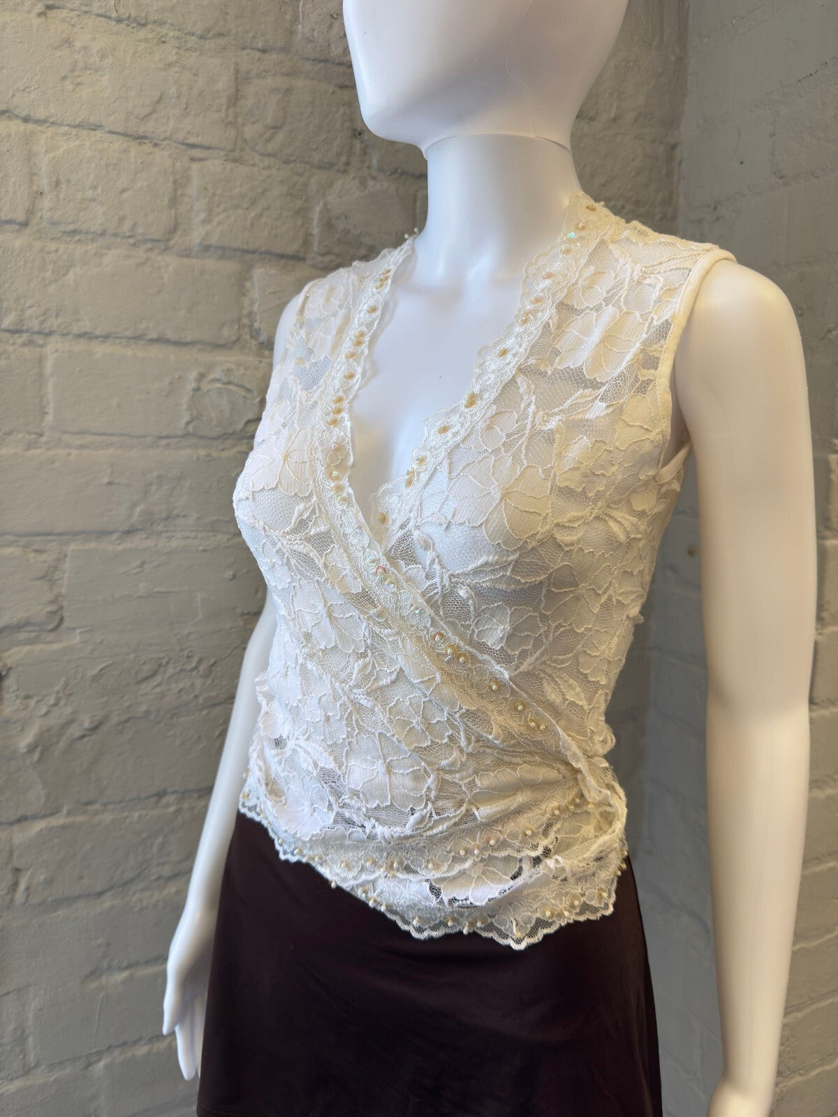 Cream Lace Sleeveless Wrap Top with Tie Back