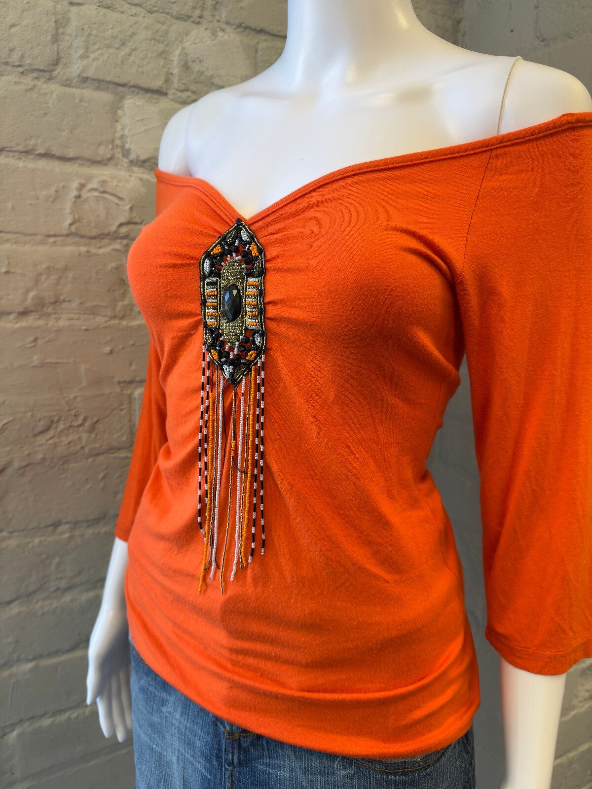 Orange Off-Shoulder Top with Beaded Fringe Detail
