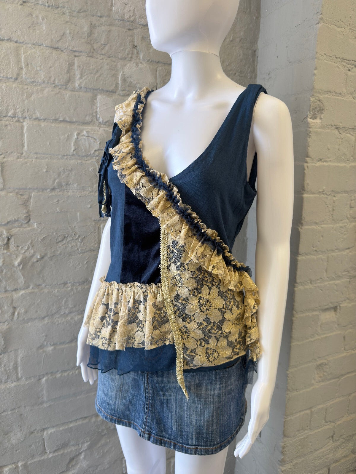 Navy Blue Sleeveless Top with Cream Lace Ruffles