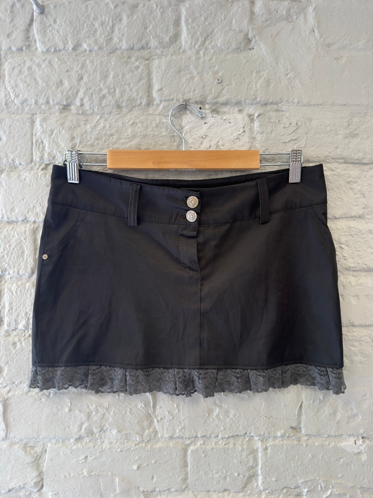 Black Mini Skirt with Lace Trim and Button Detail