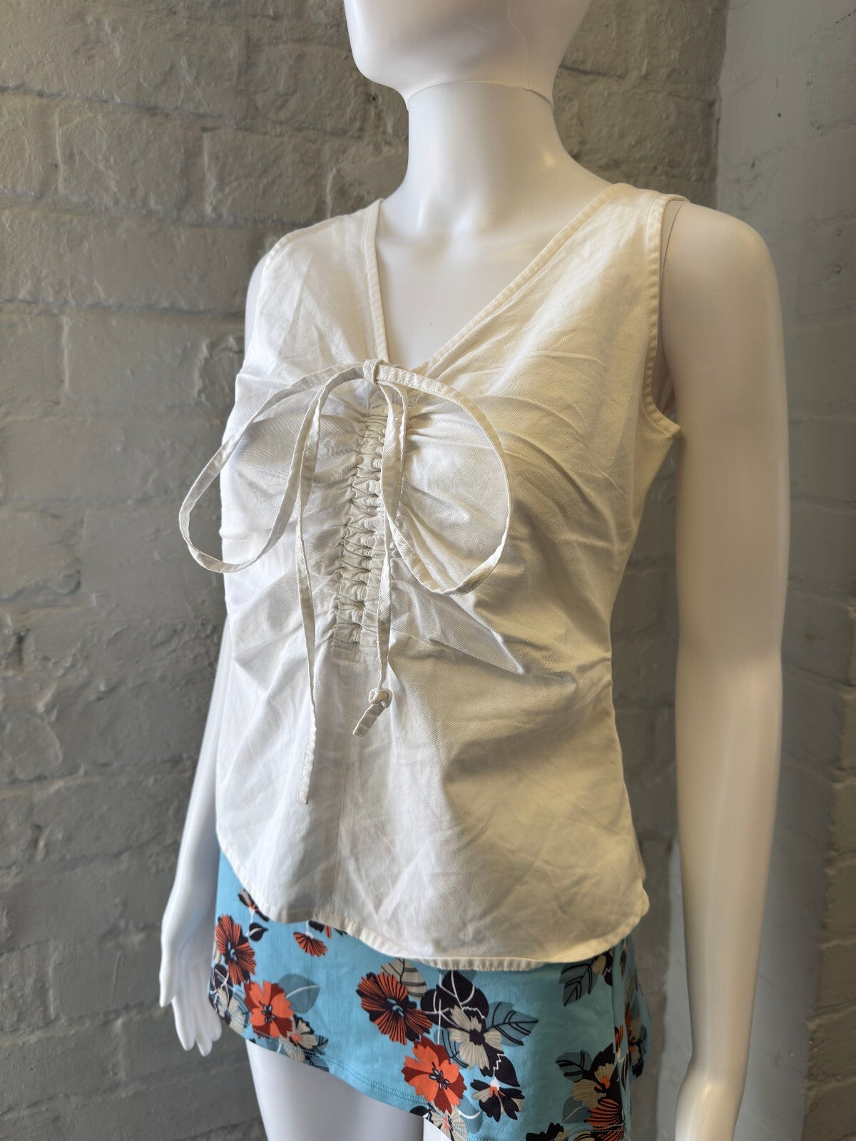White Sleeveless Top with Front Tie Detail