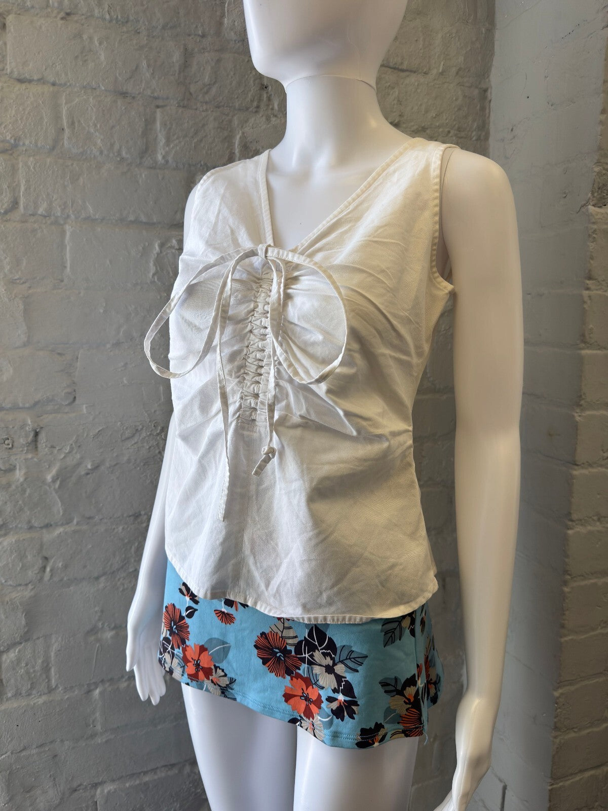 White Sleeveless Top with Front Tie Detail