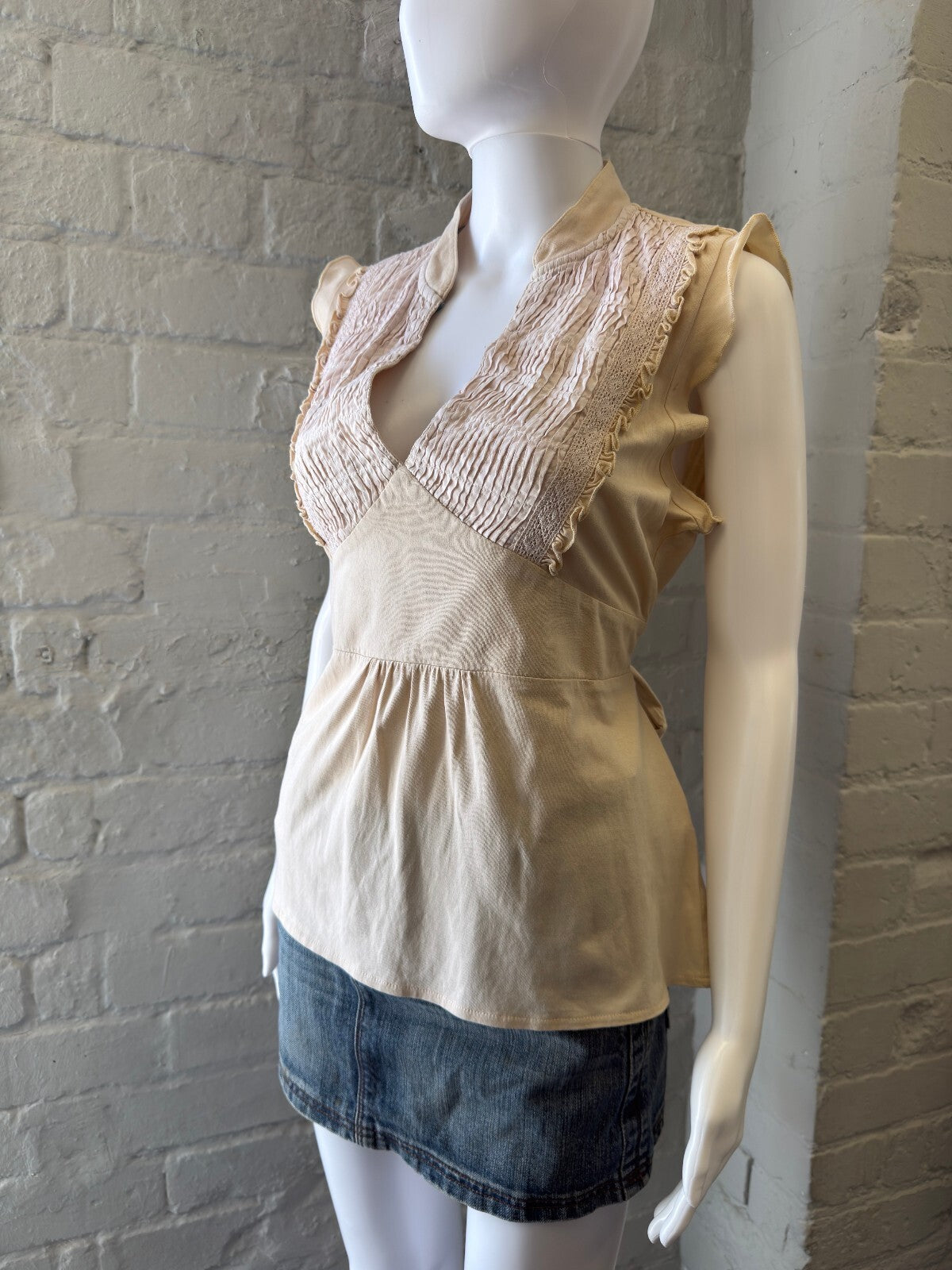 Beige Sleeveless Top with Lace Detail and Tie Back