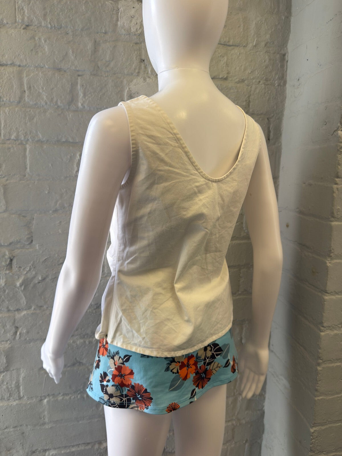 White Sleeveless Top with Front Tie Detail