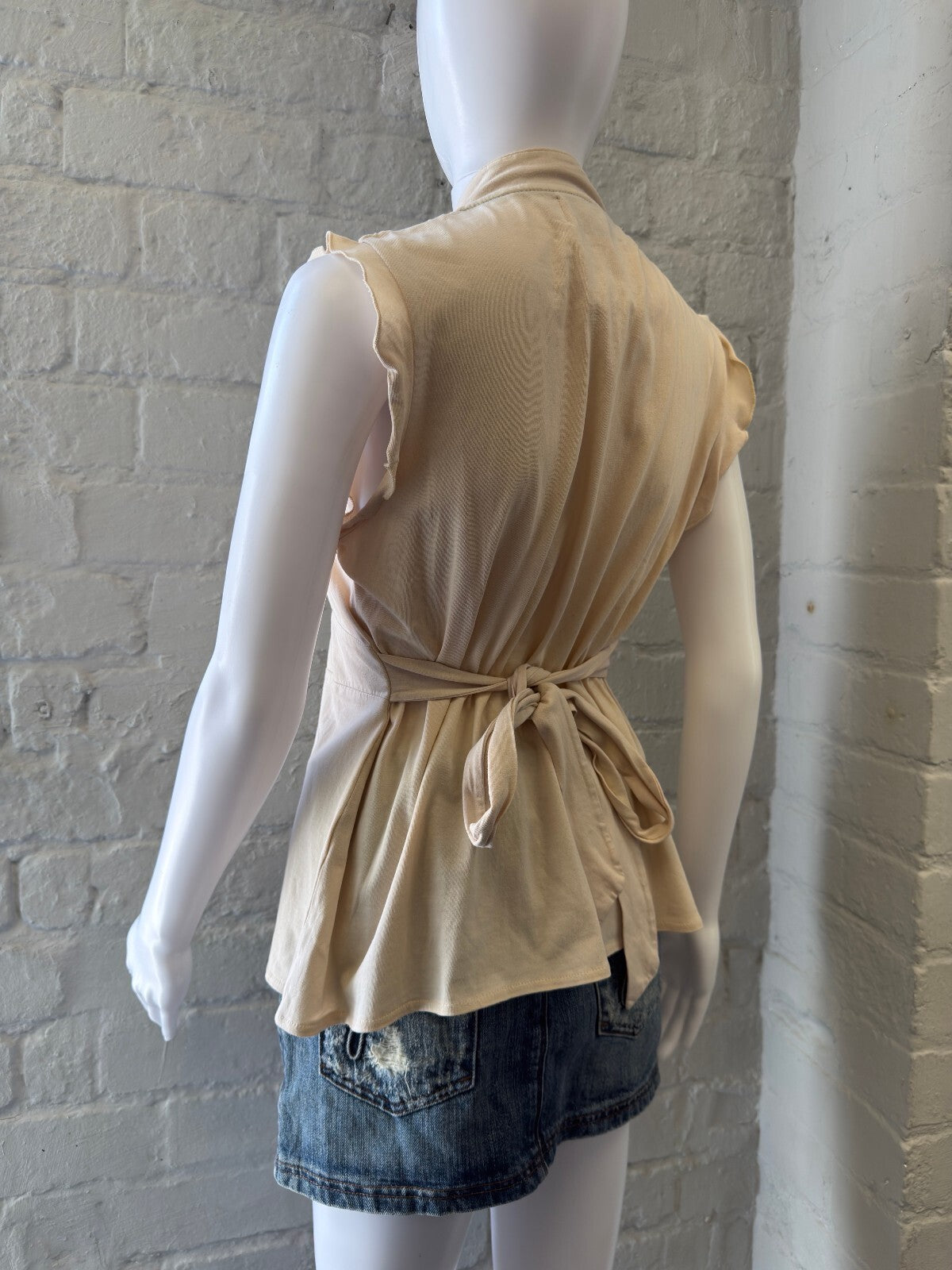 Beige Sleeveless Top with Lace Detail and Tie Back