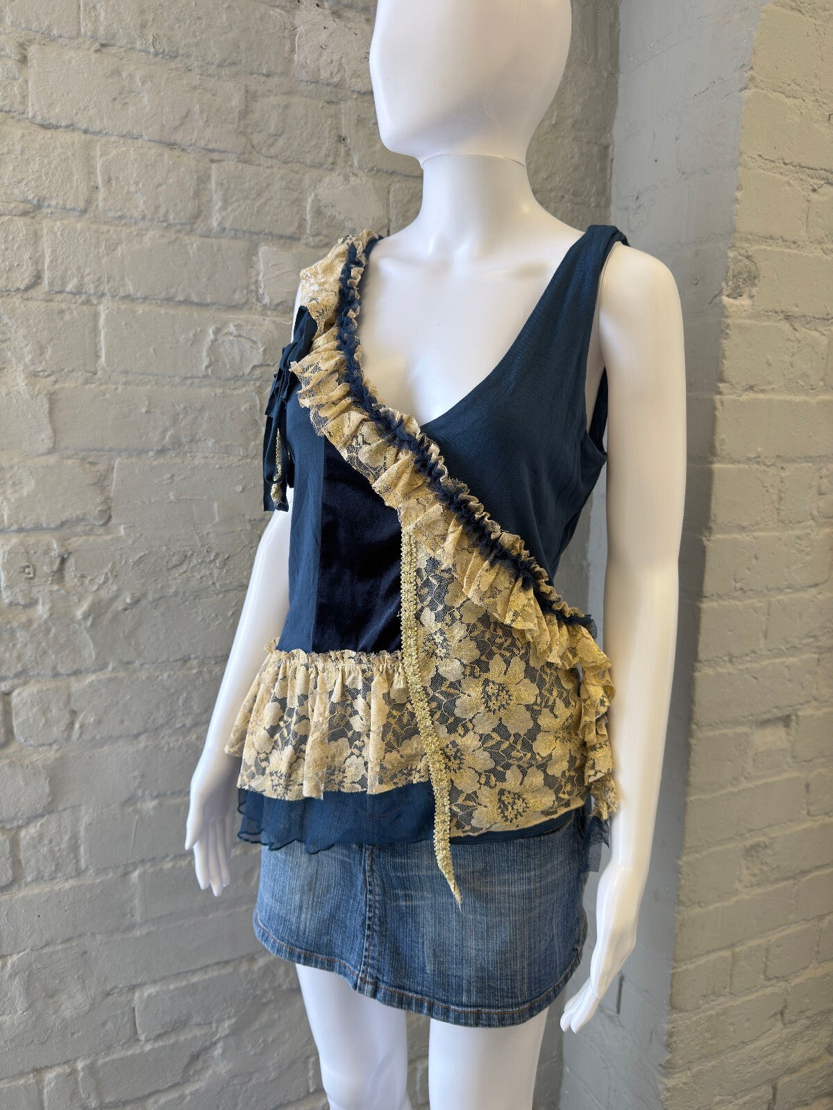 Navy Blue Sleeveless Top with Cream Lace Ruffles