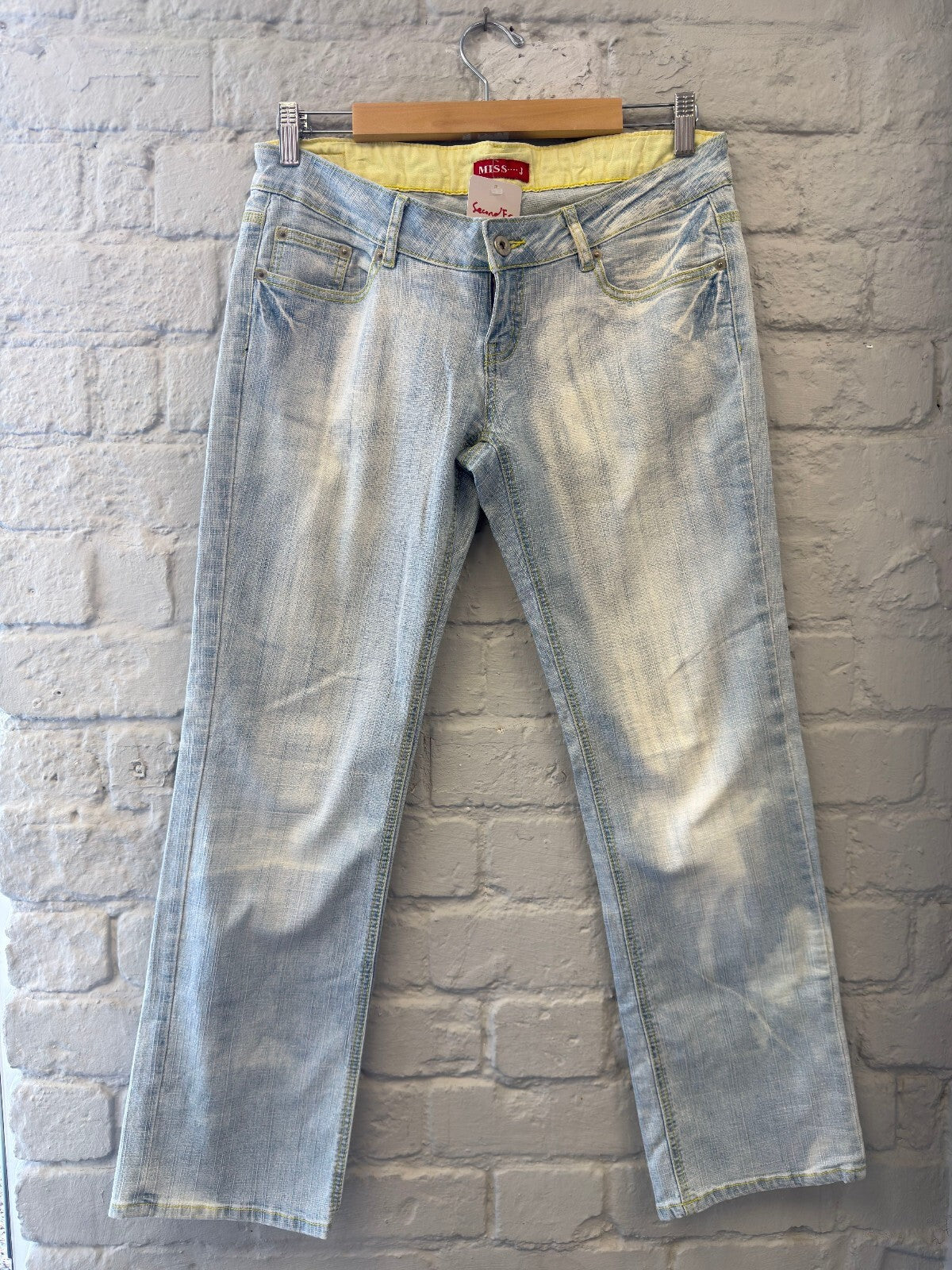 Light Wash Denim Jeans with Embellished Back Pockets