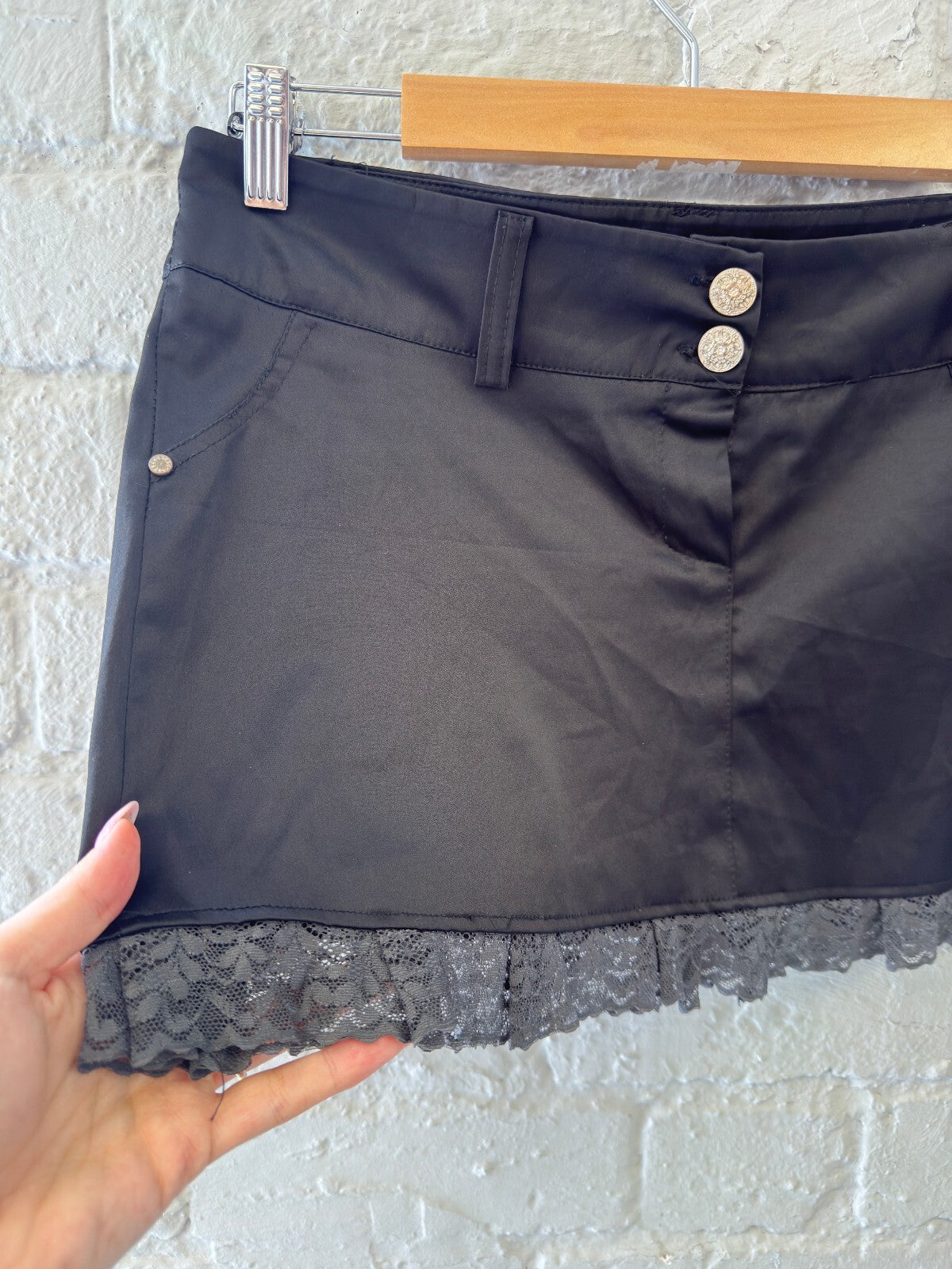 Black Mini Skirt with Lace Trim and Button Detail