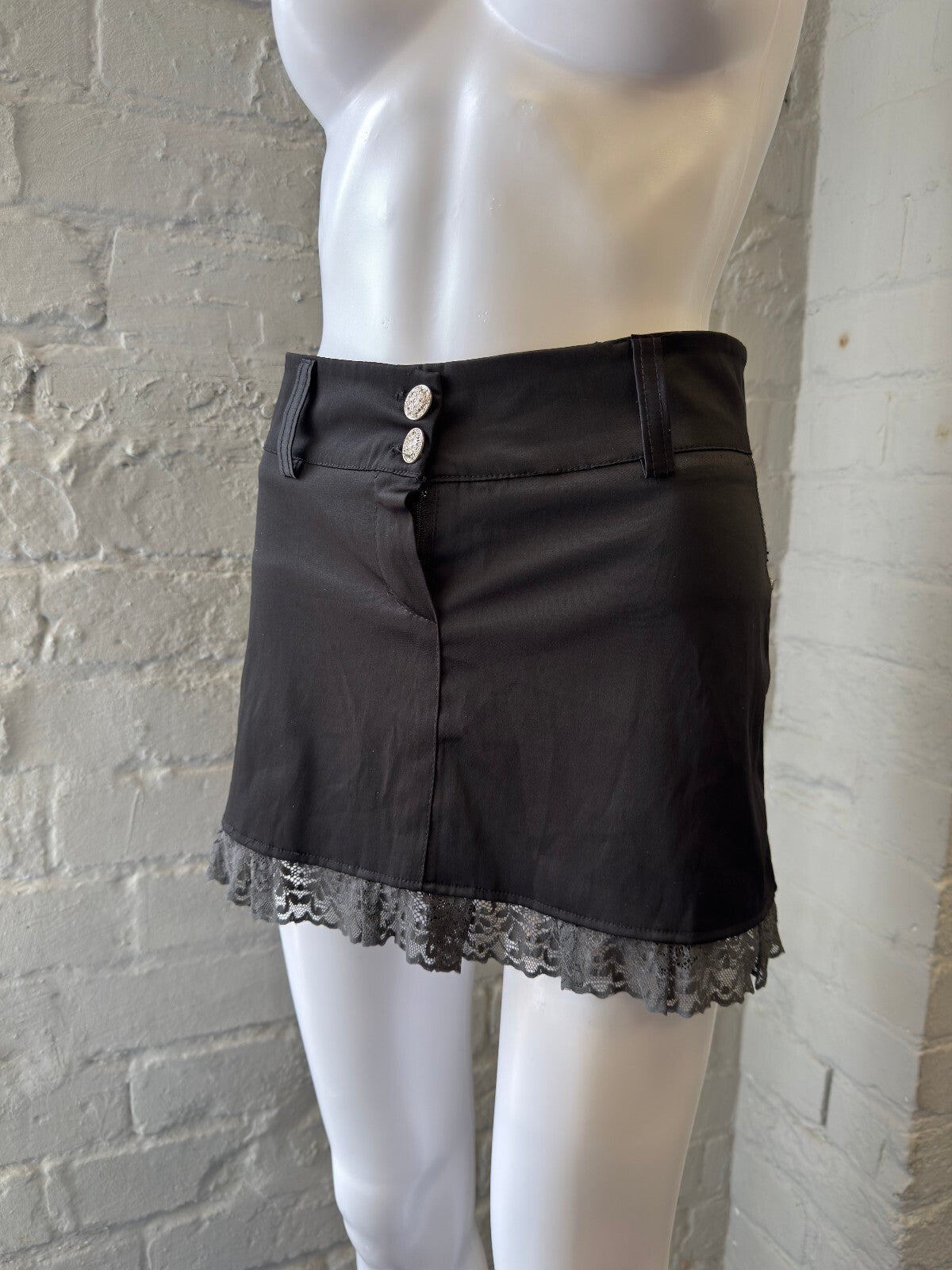 Black Mini Skirt with Lace Trim and Button Detail