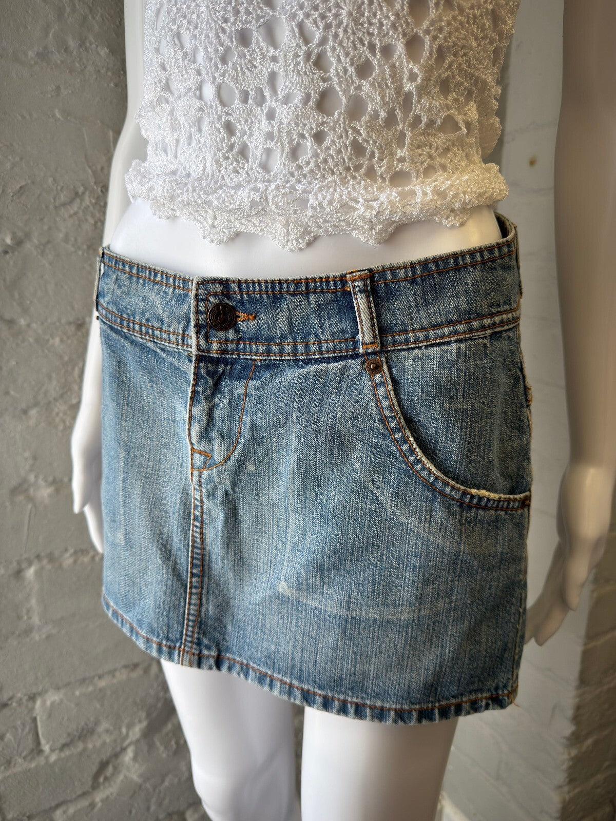 Light Blue Denim Mini Skirt with Back Pocket Detailing