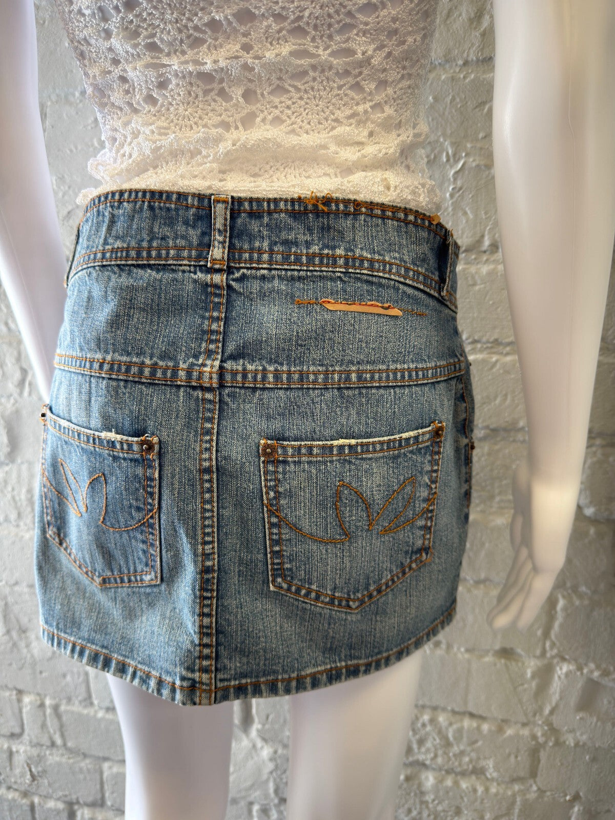 Light Blue Denim Mini Skirt with Back Pocket Detailing