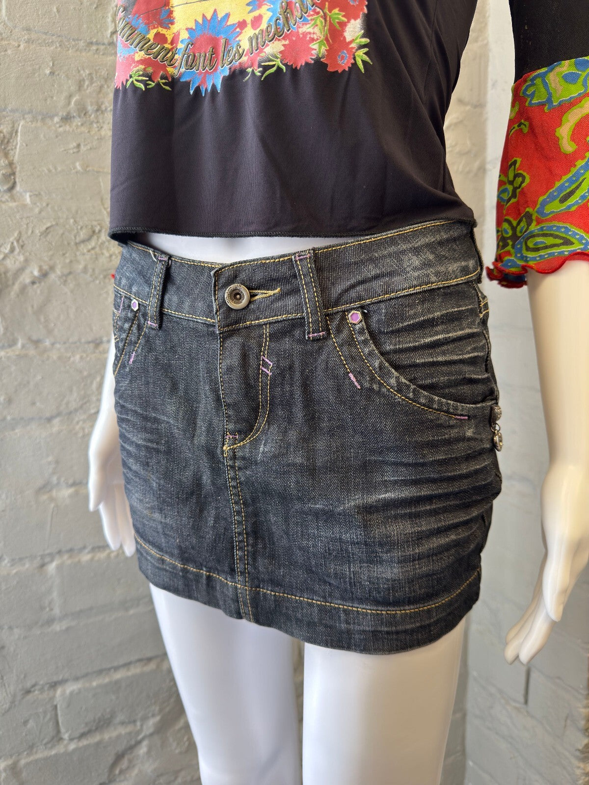 Denim Mini Skirt with Artistic Back Pocket Detail