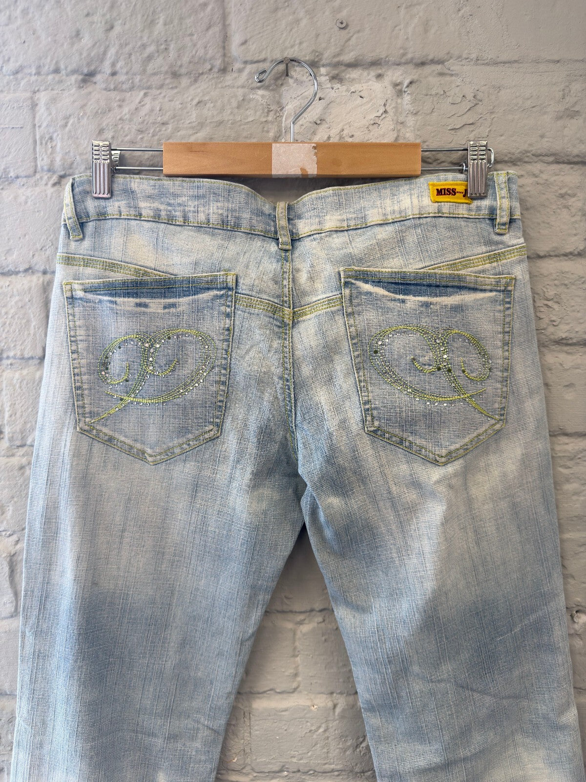 Light Wash Denim Jeans with Embellished Back Pockets