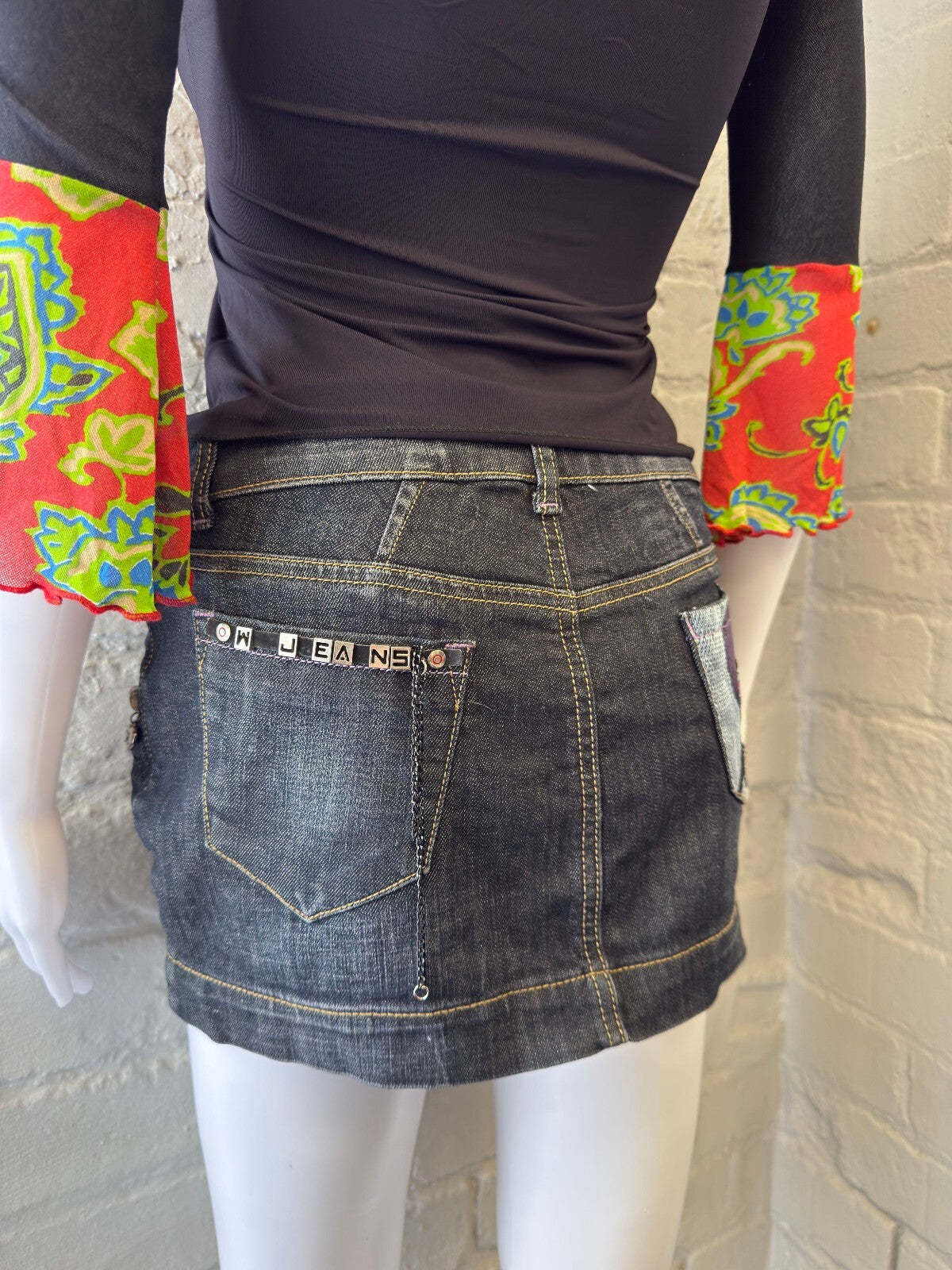 Denim Mini Skirt with Artistic Back Pocket Detail