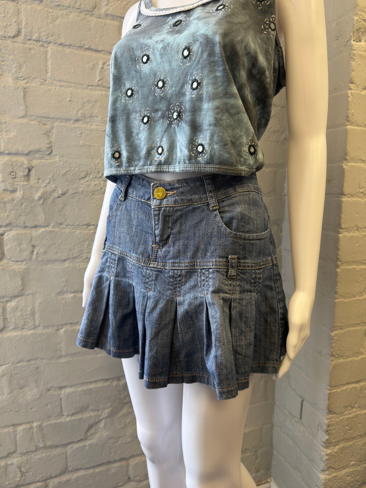 Denim Mini Skirt with Pleated Hem and Gold Button Detail