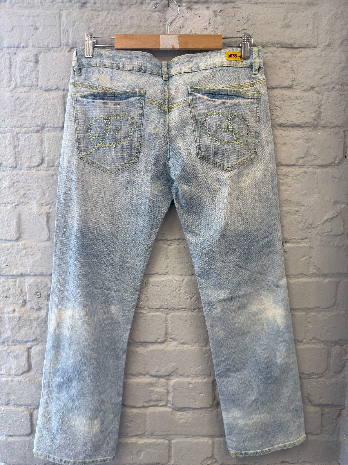 Light Wash Denim Jeans with Embellished Back Pockets