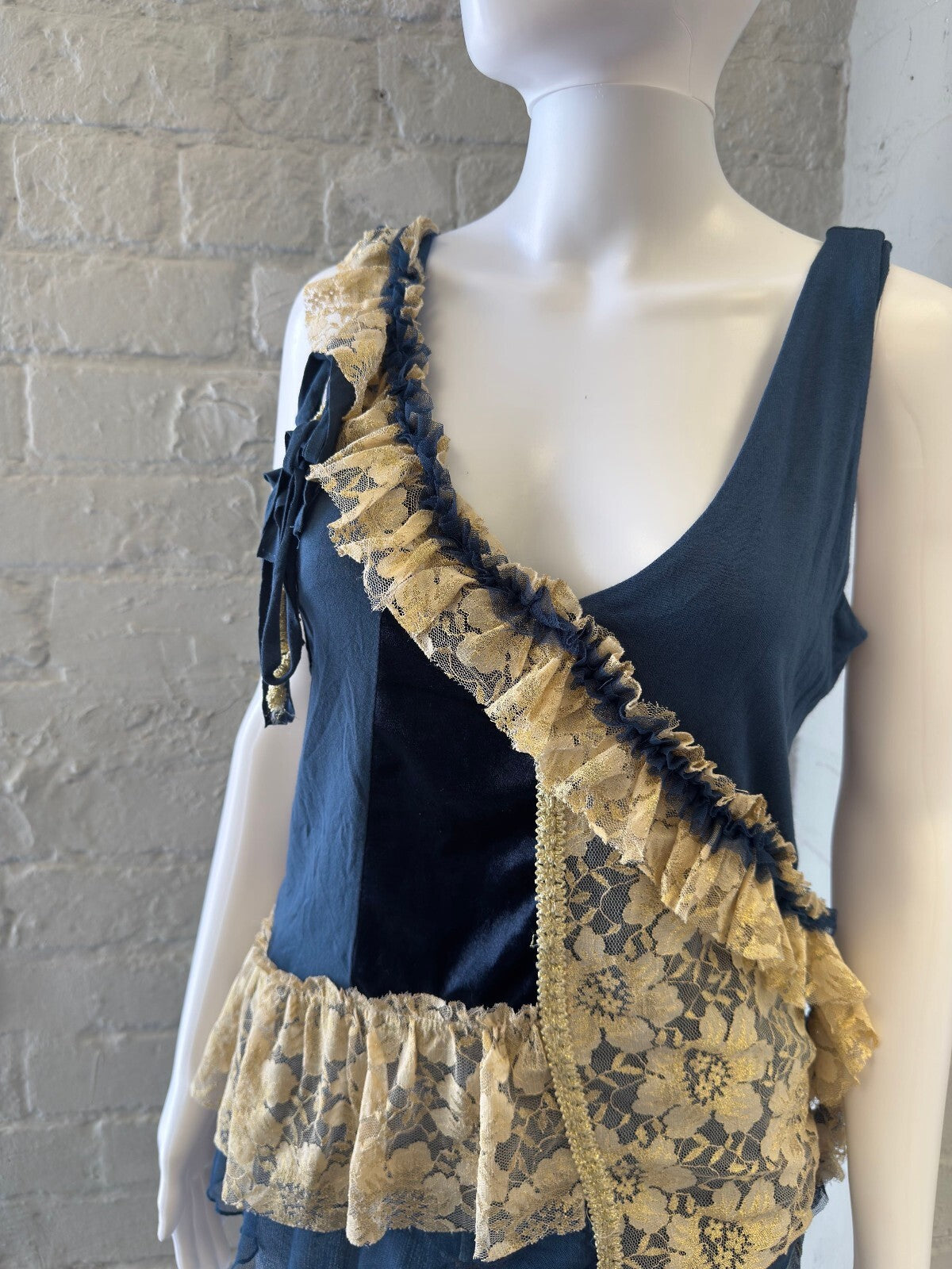 Navy Blue Sleeveless Top with Cream Lace Ruffles