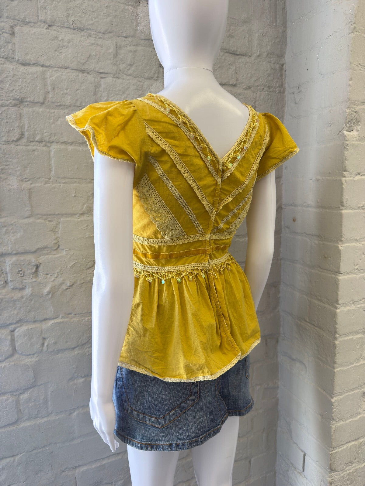 Fairy Yellow Embroidered V-Neck Peplum Blouse
